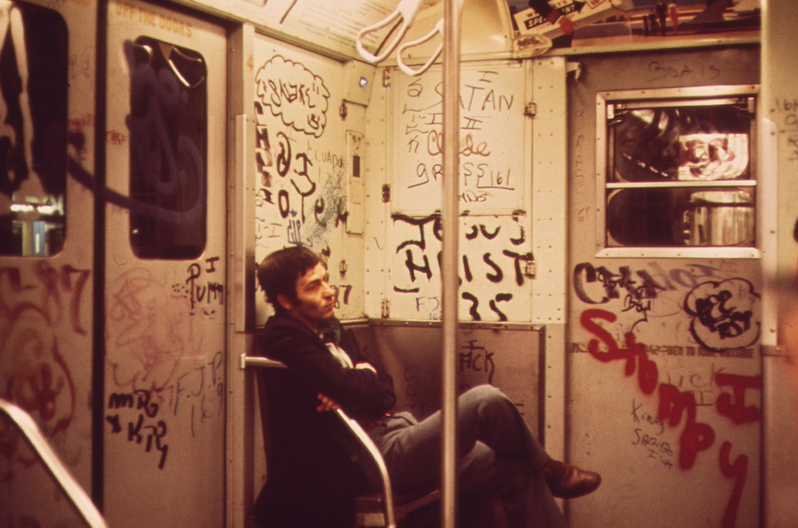 Interior of a New York subway car covered with graffiti in 1973